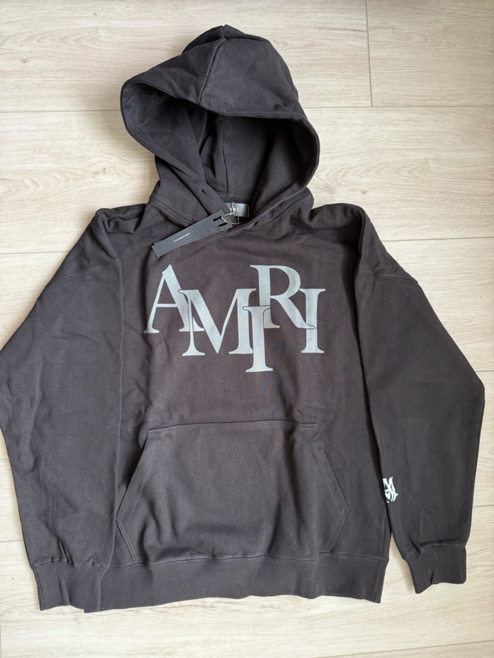 AMIRI Black Hoodie with Large Silver Logo